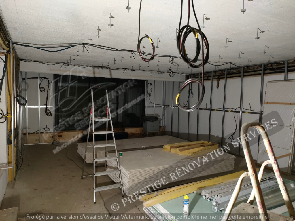 Pose des ossatures métalliques pour la rénovation d'un sous sol dans une maison en Yvelines 78